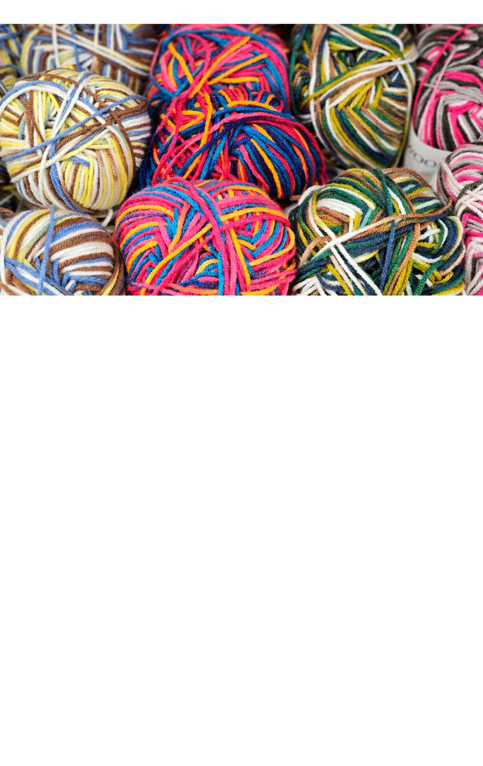 Balls of different colored yarn